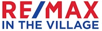 remax in the village logo